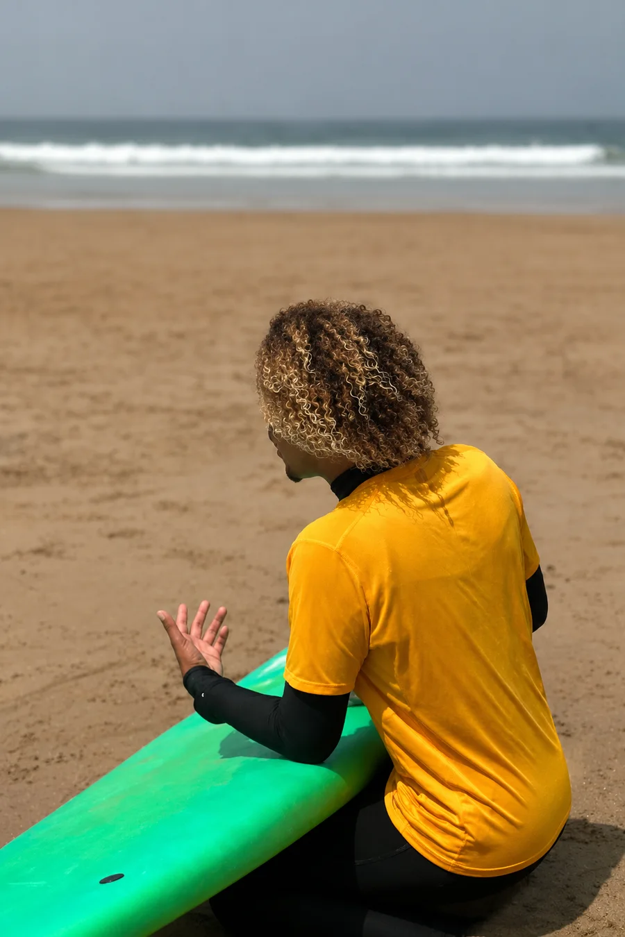 Wake Wave instructor demonstrating board technique during a lesson.