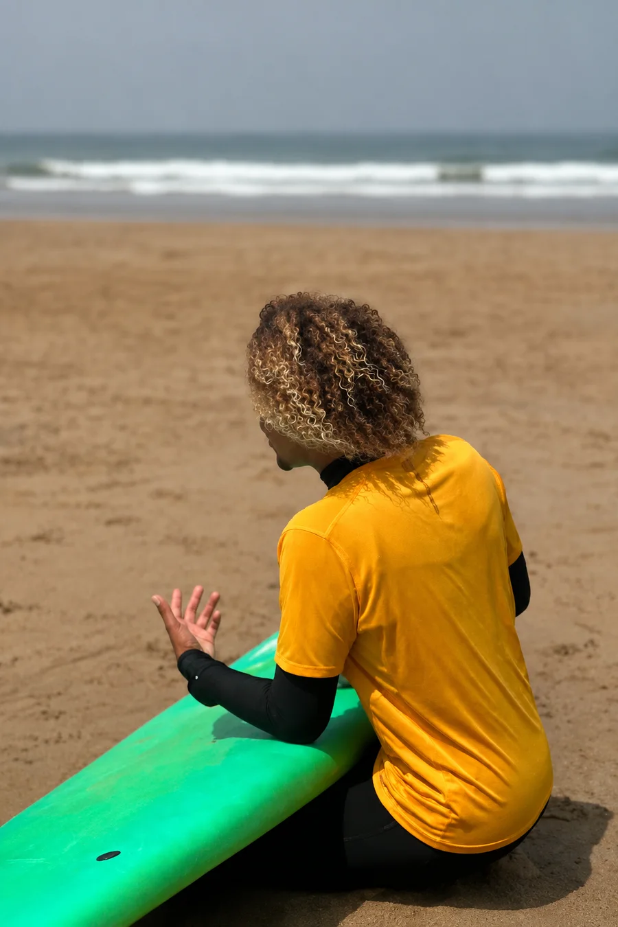 Wake Wave lesson group in wetsuits on Anza Beach.