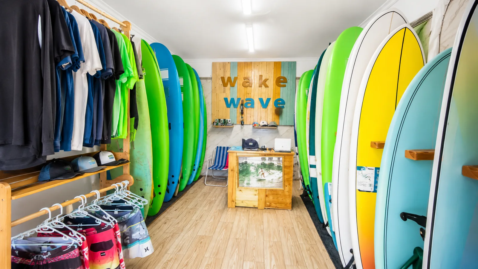 Wake Wave Surf Shop interior with surfboards lined in the shop.